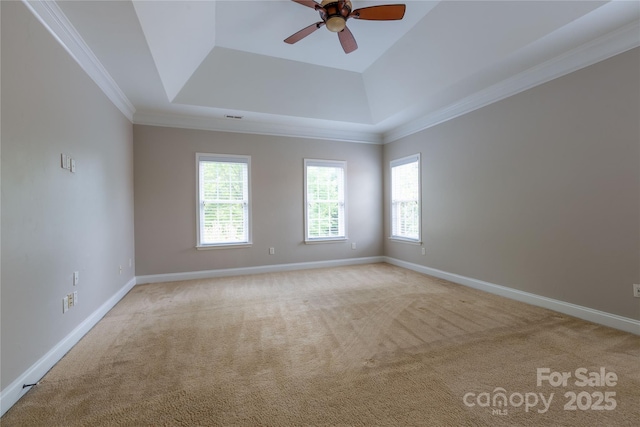 1009 Brookline Dr, Huntersville, NC 28078 - empty room featuring a tray ceiling, a ceiling fan, light carpet, and crown molding