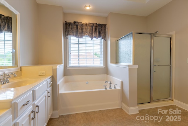 1009 Brookline Dr, Huntersville, NC 28078 - full bathroom featuring vanity, a bath, a stall shower, and tile patterned floors