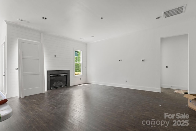 6782 Kingfisher Ct, Denver, NC 28037 - unfurnished living room with wood finished floors, a glass covered fireplace, and baseboards