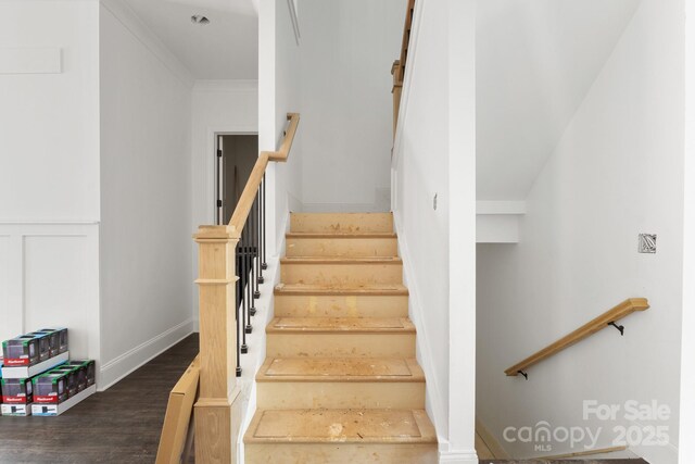 6782 Kingfisher Ct, Denver, NC 28037 - staircase featuring wood finished floors and crown molding