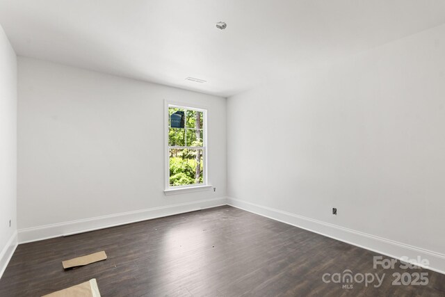 6782 Kingfisher Ct, Denver, NC 28037 - spare room with dark wood finished floors and baseboards