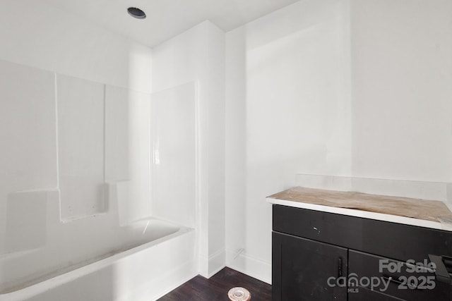 6782 Kingfisher Ct, Denver, NC 28037 - full bath featuring wood finished floors, baseboards, bathtub / shower combination, and vanity