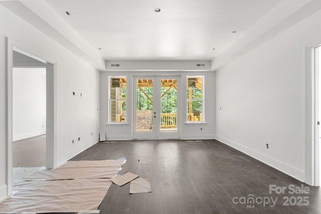 6782 Kingfisher Ct, Denver, NC 28037 - unfurnished living room featuring baseboards, wood finished floors, and french doors