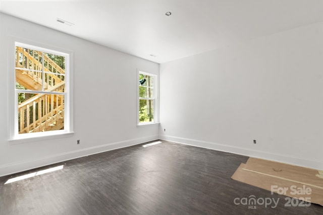 6782 Kingfisher Ct, Denver, NC 28037 - spare room featuring dark wood-type flooring and baseboards