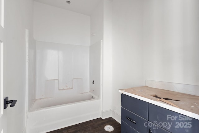 6782 Kingfisher Ct, Denver, NC 28037 - bathroom featuring wood finished floors,  shower combination, vanity, and baseboards