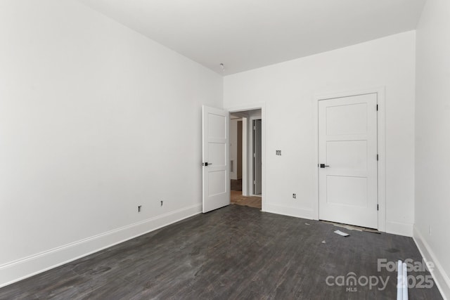 6782 Kingfisher Ct, Denver, NC 28037 - unfurnished bedroom featuring dark wood-style floors and baseboards