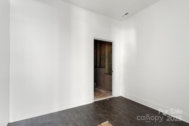 6782 Kingfisher Ct, Denver, NC 28037 - unfurnished room featuring baseboards and dark wood finished floors