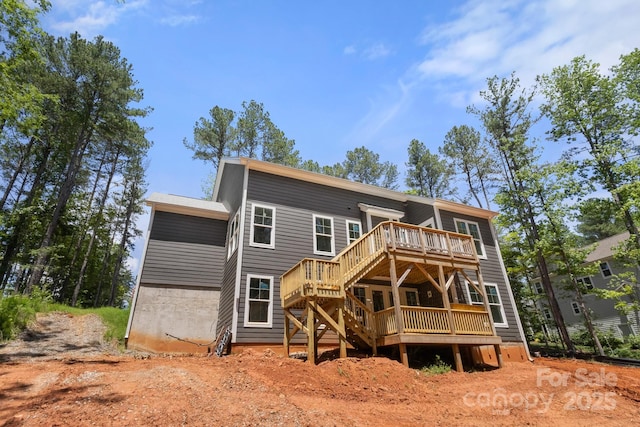 6782 Kingfisher Ct, Denver, NC 28037 - rear view of house with a wooden deck and stairs