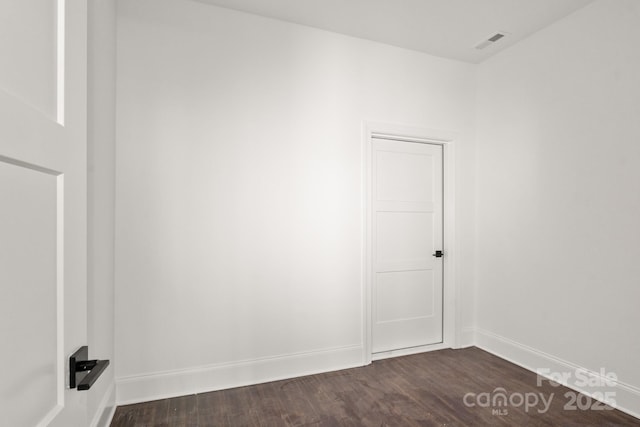 6782 Kingfisher Ct, Denver, NC 28037 - unfurnished room featuring dark wood-type flooring and baseboards