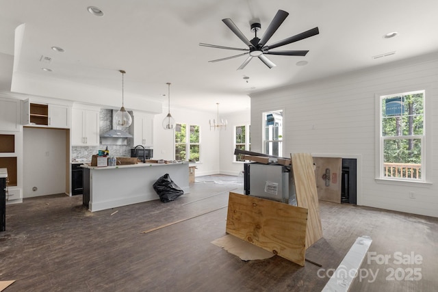 6782 Kingfisher Ct, Denver, NC 28037 - living room with a ceiling fan, wood finished floors, recessed lighting, a chandelier, and a fireplace