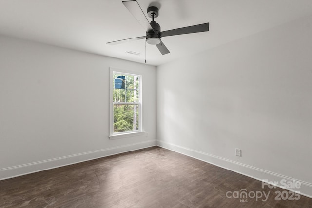6782 Kingfisher Ct, Denver, NC 28037 - empty room featuring ceiling fan and dark wood-type flooring