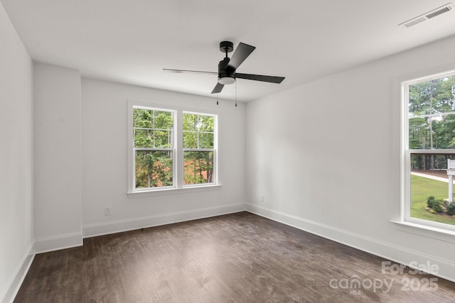 6782 Kingfisher Ct, Denver, NC 28037 - unfurnished room featuring plenty of natural light, dark wood finished floors, and ceiling fan