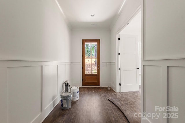 6782 Kingfisher Ct, Denver, NC 28037 - foyer entrance with wood finished floors, a wainscoted wall, and a decorative wall