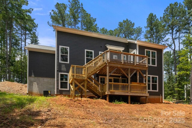 6782 Kingfisher Ct, Denver, NC 28037 - back of house featuring a wooden deck and stairs