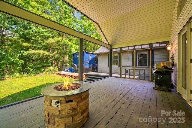 2 Candlestick Dr, Zirconia, NC 28790 - wooden terrace featuring a fire pit, grilling area, and a yard