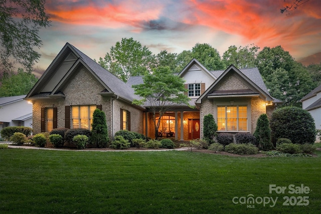 9002 Fair Oak Dr, Sherrills Ford, NC 28673 - craftsman-style house with brick siding and a yard