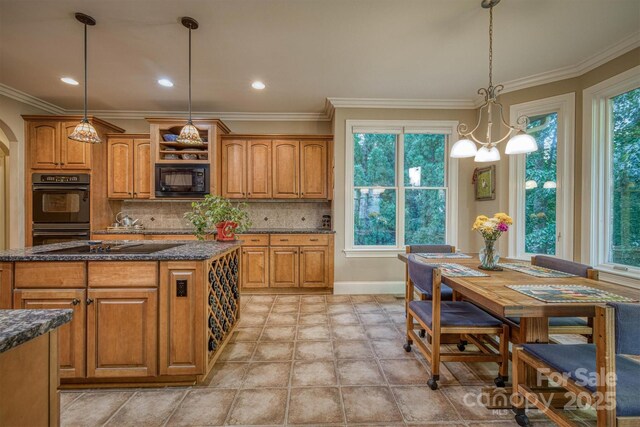 9002 Fair Oak Dr, Sherrills Ford, NC 28673 - kitchen with black appliances, backsplash, brown cabinets, dark stone countertops, and crown molding