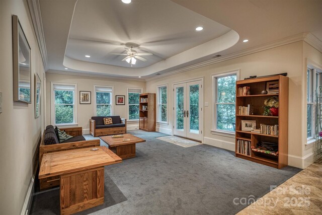 9002 Fair Oak Dr, Sherrills Ford, NC 28673 - living room with french doors, a tray ceiling, a ceiling fan, carpet flooring, and recessed lighting