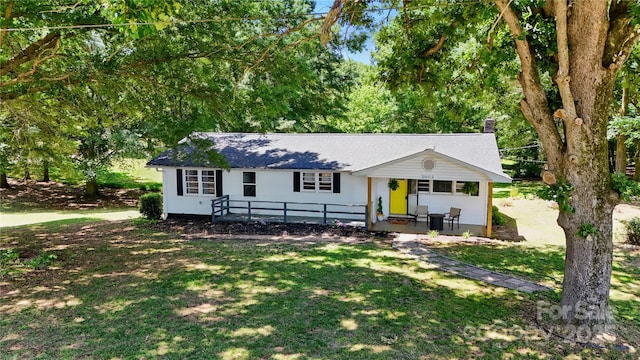 2903 Price Rushing Rd, Monroe, NC 28110 - single story home with a chimney, a front lawn, and a shingled roof