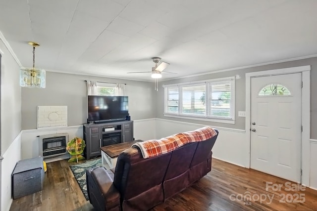 2903 Price Rushing Rd, Monroe, NC 28110 - living area featuring plenty of natural light, crown molding, dark wood finished floors, heating unit, and a ceiling fan