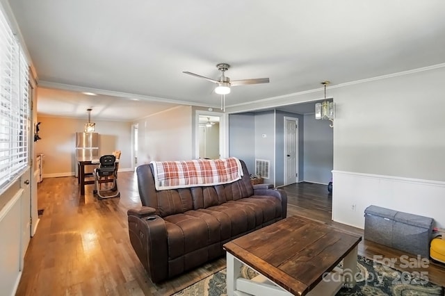 2903 Price Rushing Rd, Monroe, NC 28110 - living area with a ceiling fan, wood finished floors, and crown molding