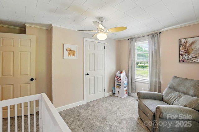 2903 Price Rushing Rd, Monroe, NC 28110 - bedroom featuring crown molding, carpet floors, a crib, ceiling fan, and baseboards