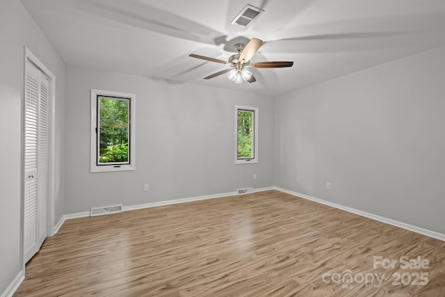 13446 Idlefield Ln, Matthews, NC 28105 - unfurnished bedroom featuring light wood-style flooring and baseboards