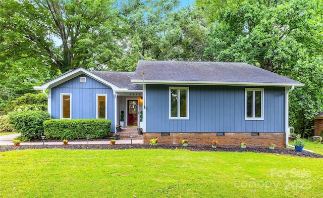 13446 Idlefield Ln, Matthews, NC 28105 - view of front of property featuring crawl space, a front lawn, and roof with shingles