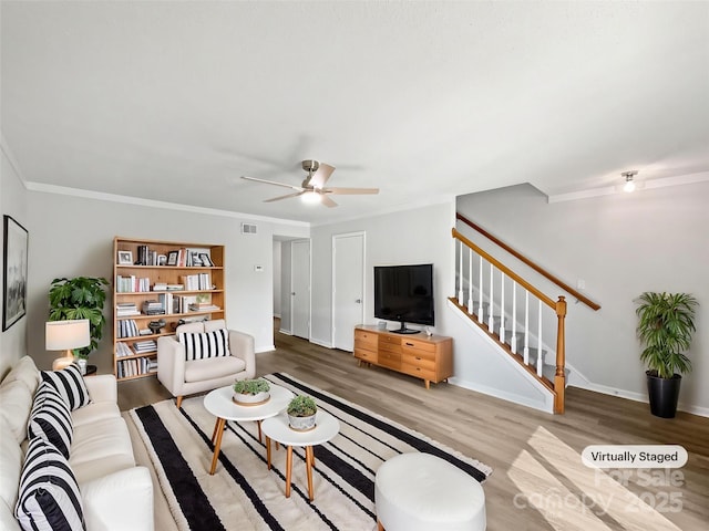 1908 Harvest Ln Unit 5, Charlotte, NC 28210 - living room with wood finished floors, stairs, a ceiling fan, crown molding, and baseboards