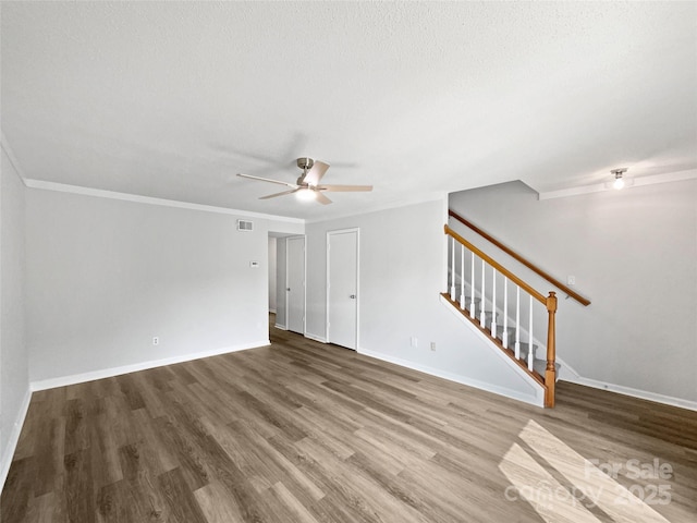 1908 Harvest Ln Unit 5, Charlotte, NC 28210 - unfurnished living room with stairs, ceiling fan, wood finished floors, crown molding, and baseboards