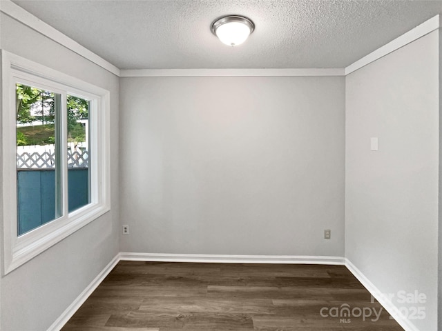 1908 Harvest Ln Unit 5, Charlotte, NC 28210 - spare room featuring dark wood-style flooring, a textured ceiling, and baseboards