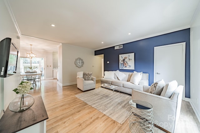 5927 Quail Hollow Rd Unit H, Charlotte, NC 28210 - living area with ornamental molding, wood finished floors, a chandelier, baseboards, and recessed lighting