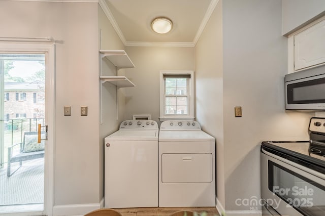 5927 Quail Hollow Rd Unit H, Charlotte, NC 28210 - laundry area with ornamental molding, washing machine and clothes dryer, and baseboards