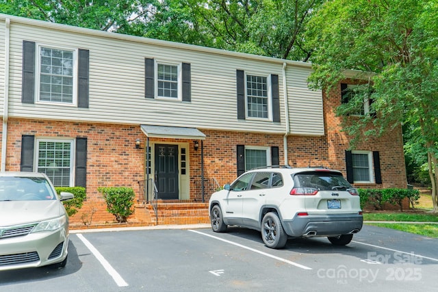 5927 Quail Hollow Rd Unit H, Charlotte, NC 28210 - multi unit property featuring uncovered parking and brick siding