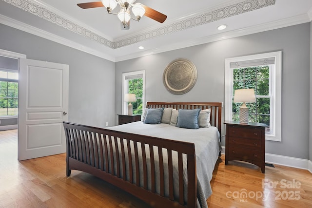 12900 Westmoreland Rd, Huntersville, NC 28078 - bedroom with wood finished floors, crown molding, recessed lighting, and baseboards