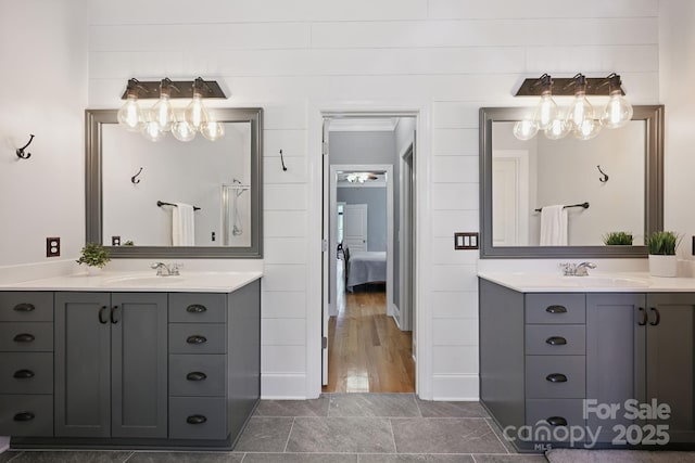 12900 Westmoreland Rd, Huntersville, NC 28078 - full bath featuring ensuite bath, two vanities, and baseboards