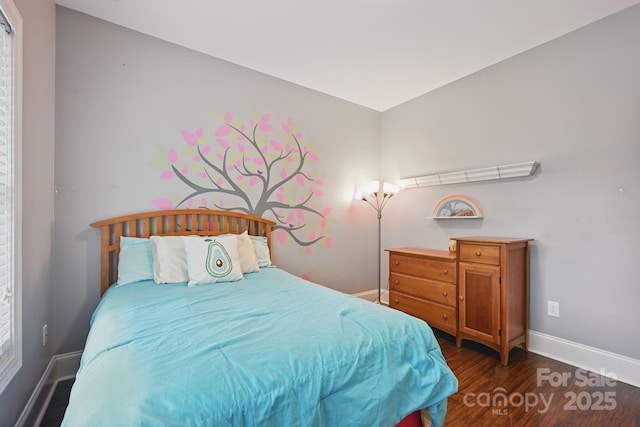 12900 Westmoreland Rd, Huntersville, NC 28078 - bedroom featuring baseboards and dark wood-type flooring