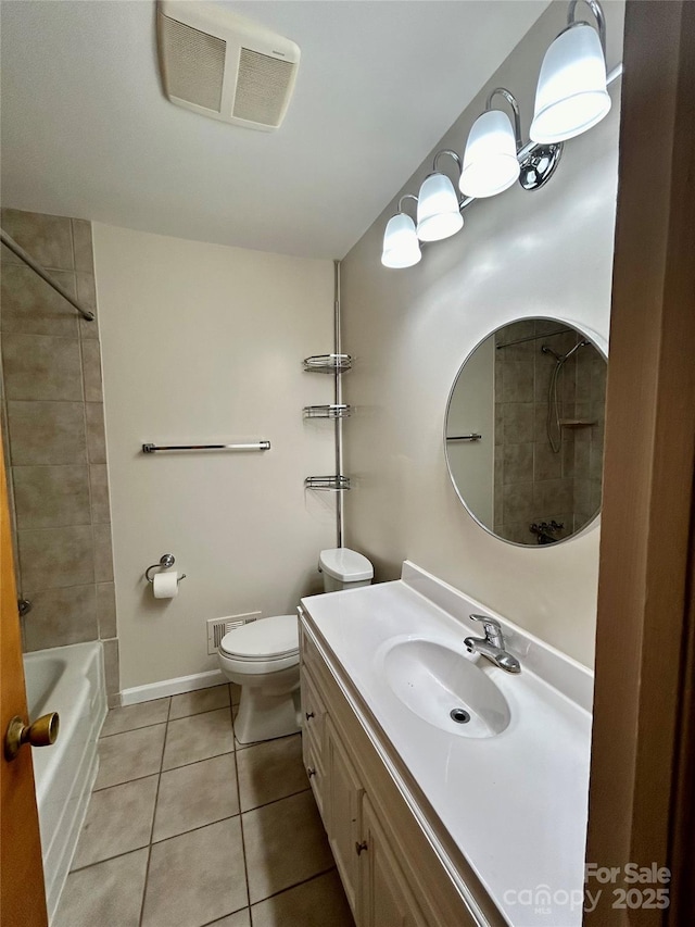 5734 Brookhaven Rd, Charlotte, NC 28210 - bathroom with tile patterned floors, vanity, toilet, and washtub / shower combination