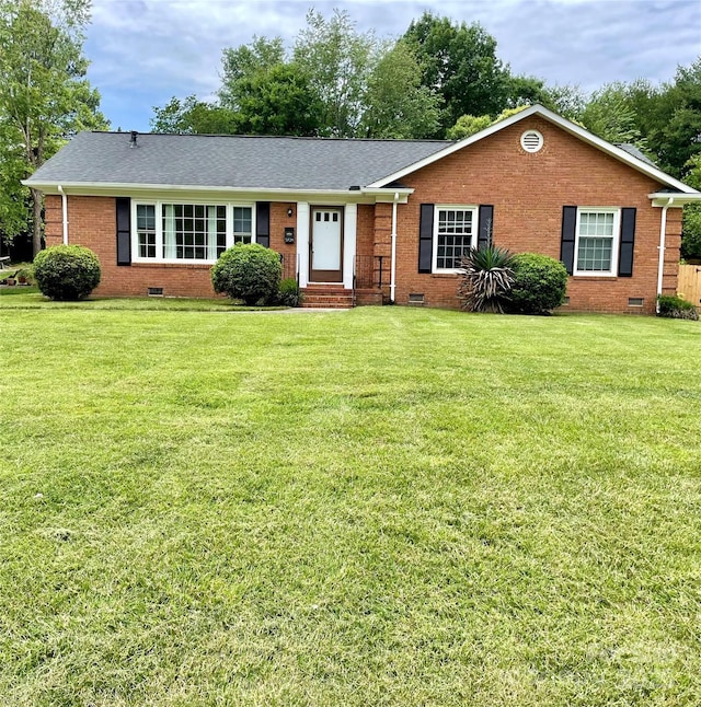 5734 Brookhaven Rd, Charlotte, NC 28210 - ranch-style home featuring crawl space, brick siding, a front lawn, and roof with shingles