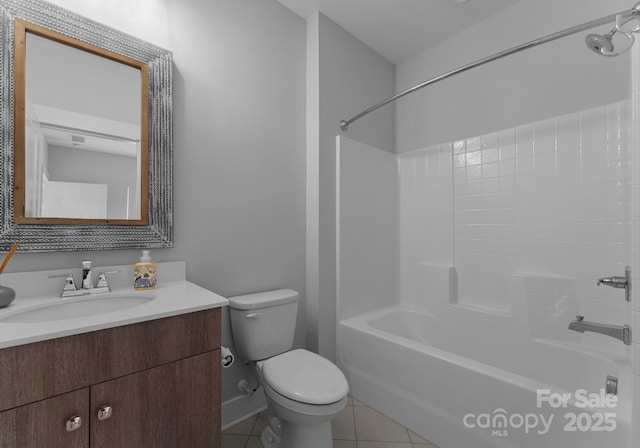 4021 Redwood Ave, Charlotte, NC 28205 - bathroom featuring toilet, vanity, shower / tub combination, and tile patterned floors