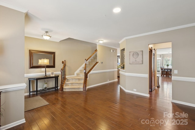 4430 Bravery Pl SW, Concord, NC 28027 - entrance foyer featuring stairs, wood finished floors, ornamental molding, and baseboards