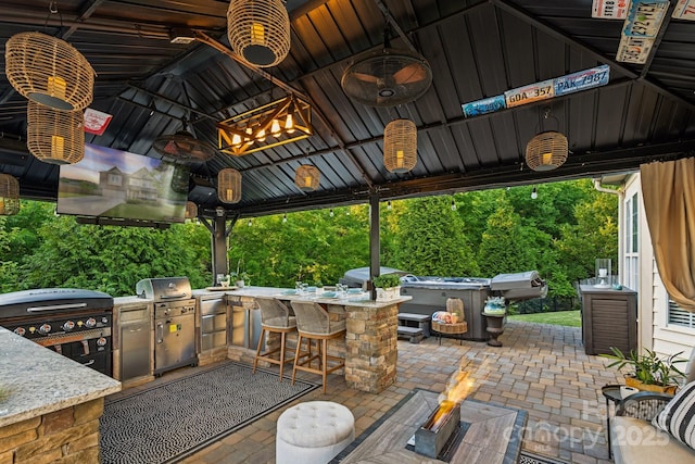 4430 Bravery Pl SW, Concord, NC 28027 - view of patio / terrace with a gazebo and a fire pit