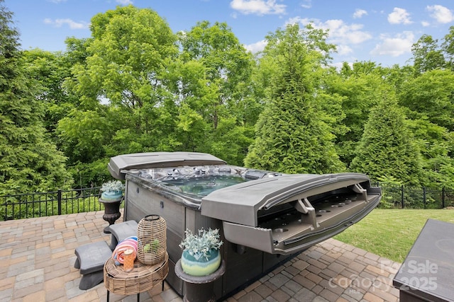 4430 Bravery Pl SW, Concord, NC 28027 - view of patio with a hot tub