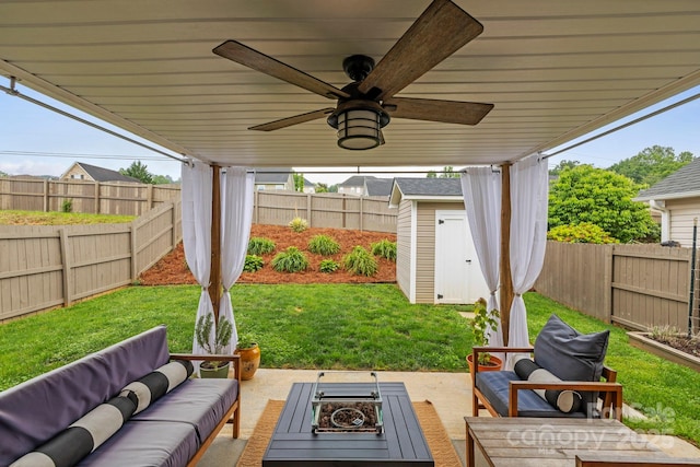 20 Daphne Dr, Arden, NC 28704 - view of patio with an outdoor living space with a fire pit and ceiling fan