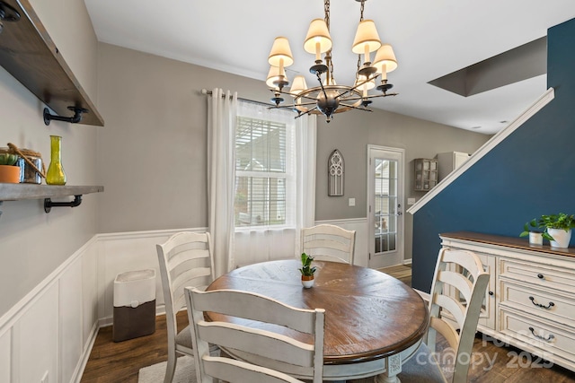 20 Daphne Dr, Arden, NC 28704 - dining area featuring a chandelier, dark wood-style floors, and a wainscoted wall