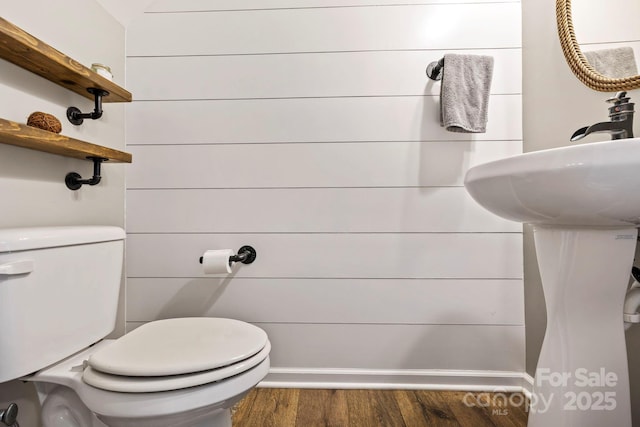 20 Daphne Dr, Arden, NC 28704 - half bath with wood finished floors and toilet