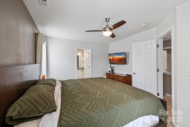 20 Daphne Dr, Arden, NC 28704 - bedroom with a ceiling fan and connected bathroom