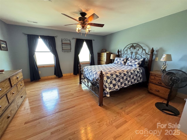 658 Green Point Ln, Boomer, NC 28606 - bedroom with light wood-style floors and a ceiling fan