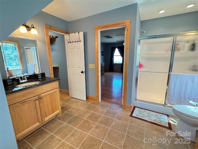 658 Green Point Ln, Boomer, NC 28606 - full bath featuring tile patterned flooring, vanity, a stall shower, and recessed lighting