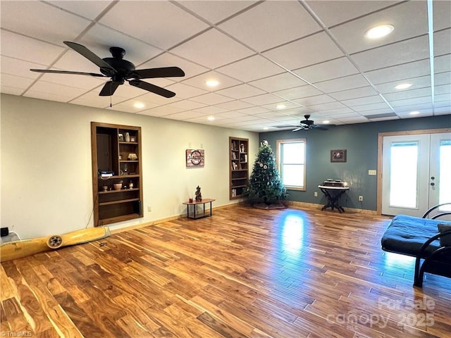 658 Green Point Ln, Boomer, NC 28606 - living room with a ceiling fan, wood finished floors, french doors, recessed lighting, and a drop ceiling